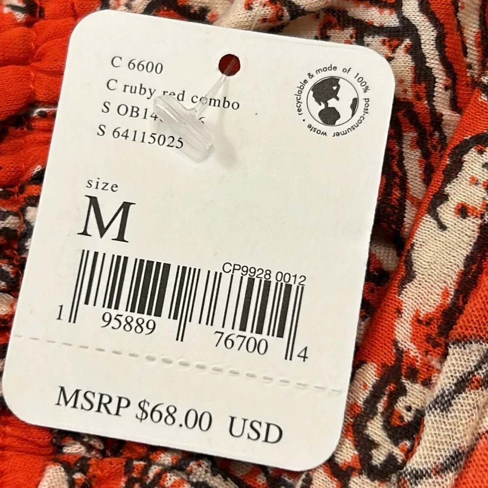 NWT FREE PEOPLE M Say the Word top with balloon sleeves in funky V neck style